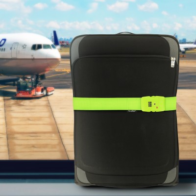 TSA Combination Luggage Strap from Travel Blue Available in Purple and Bright Green Shown on Suitcase